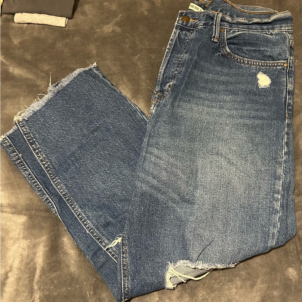 Distressed Blue Denim Jeans
